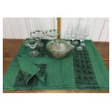 Tablecloth, painted glasses, plates, champagne