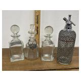Liquor decanters and vintage seltzer bottle etcï¿½