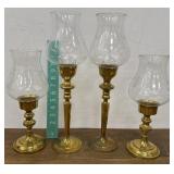 Brass candle sticks and etched glass globes