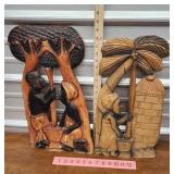 2 hand carved wooden African placks