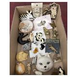 Cat brooches, Estï¿½e Lauder perfume solid cat,