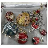 Costume jewelry ï¿½ladybugsï¿½ earrings, brooches,