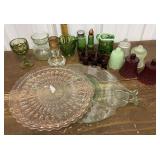 Glass plates, peg cup votive holders, creamers,