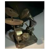 Handcrafted welded, steel drummer sculpture.