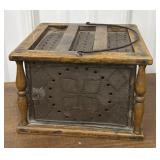 Primitive pierced tin foot warmer