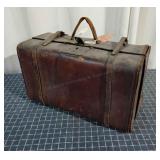 R2 Rusty brown coloured Suitcase