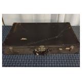 Q3 Locked with key black hardside Suitcase 32" L,