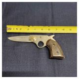 Mc Knife pistol united co Stainless steel , over a