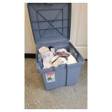 A 18x18x16in Rubbermade Tot Dish Rags and Towels