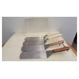 A 4 Spatulas. 2 are 2 ï¿½ by 3 are perforated