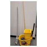 A Libman Commercial Mop Buc With Wringer and 2 Mop