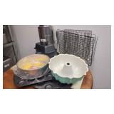A Tote of Baking Supplies Cooling racks Sifter,