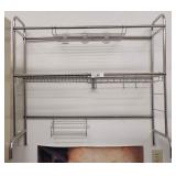 A Stainless Steel Floor/Wal 34inches wide, 31inche