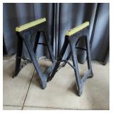 Set of two folding sawhorses featuring black/gray