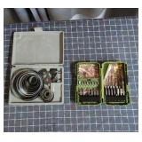 Tool lot featuring a hole saw set paired with a Cr