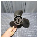 Three-blade aluminum boat propelle, appearing to b