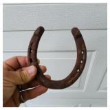 Traditional lucky horseshoe, a classic symbol of g
