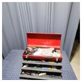 Toolbox complete with assorted hand tools. A pract
