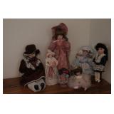 7 Small Porcelain Dolls