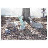 3 lawn deer, nymph, beaver, raccoon