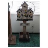 Decorative birdhouses on stand