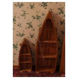 Two Boat Shaped Shelf Units in Hallway