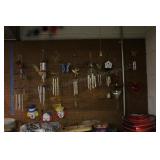 Group of small windchimes on pegboard