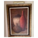 Framed still life canvas print with museum light
