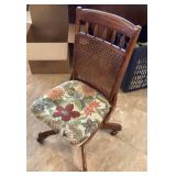 Rolling office chair with cane back
