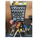Organizer and tools on workbench in garage