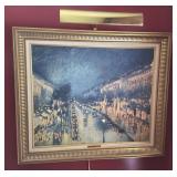 Framed canvas print with museum light