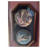 2 Christmas collector plates in display frame
