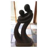 24" modern embracing figures sculpture