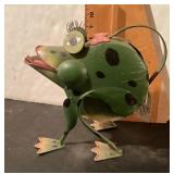 Metal frog watering can