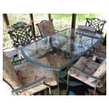 Glass top patio table and 6 chairs