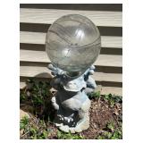 Frog with glass gazing ball