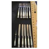Mother of pearl handled forks and knives