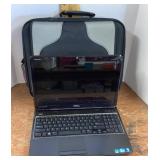 Dell Inspiron laptop with bag