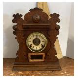Antique shelf clock with open escapement