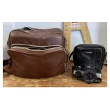 Minolta 110 zoom camera with bag and accessories