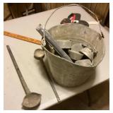 Bucket of lead and ladles