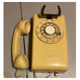 Yellow rotary dial wall phone