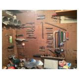 Contents of pegboard around workbench