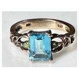 Gold over sterling silver blue topaz ring