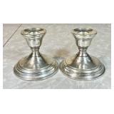 Pair of weighted sterling candle holders