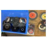 Tote of grinding wheels and wire brushes