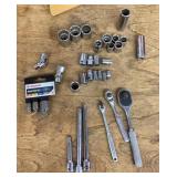 Assorted standard 3/8" &1/4 sockets and ratchets