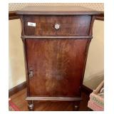 Small bar cabinet with glasses