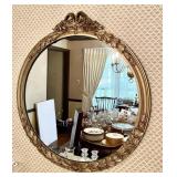 27" diameter gold framed wall mirror