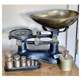 Antique Victor balance scale with weights